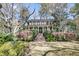 Stately two-story home with columned porch and manicured front lawn, offering classic elegance and curb appeal at 2292 Beckenham Dr, Mount Pleasant, SC 29466