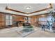 Home gym with exercise equipment, wood paneled walls, and carpeted flooring provides space for workouts at 2292 Beckenham Dr, Mount Pleasant, SC 29466