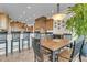 Kitchen and dining area offering custom cabinetry, a large island, and a seamless flow at 2292 Beckenham Dr, Mount Pleasant, SC 29466