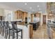 Well-appointed kitchen with custom cabinets, granite countertops, an island, and stainless steel appliances at 2292 Beckenham Dr, Mount Pleasant, SC 29466