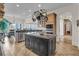 Open kitchen with custom cabinets, granite countertops, and a large island with great flow at 2292 Beckenham Dr, Mount Pleasant, SC 29466