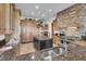 Large kitchen with granite countertops, stainless steel appliances, custom cabinetry, and a center island at 2292 Beckenham Dr, Mount Pleasant, SC 29466