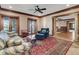 Cozy living room with a large rug, comfortable seating, and natural light streaming through glass doors at 2292 Beckenham Dr, Mount Pleasant, SC 29466