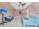 Spacious carpeted bedroom features large window, ceiling fan, and sloped ceilings at 235 Scalybark Rd, Summerville, SC 29485