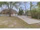Long driveway leading to a two-car garage with a brick home at 235 Scalybark Rd, Summerville, SC 29485