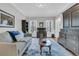 Comfortable living room with built-ins and a workspace featuring natural light at 235 Scalybark Rd, Summerville, SC 29485
