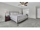 Spacious bedroom with ceiling fan and adjacent bathroom at 235 Scalybark Rd, Summerville, SC 29485