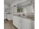 This bathroom features double sinks, granite countertops, and a large mirror at 253 Palmetto Walk Dr, Summerville, SC 29486