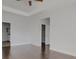 A light and airy bedroom with hardwood floors and access to an ensuite bathroom and walk-in closet at 253 Palmetto Walk Dr, Summerville, SC 29486