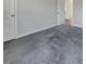 Neutral bedroom featuring soft gray carpet, white trim and doors, and plenty of natural light at 253 Palmetto Walk Dr, Summerville, SC 29486