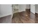 Hallway featuring hardwood floors and views into the bathroom at 253 Palmetto Walk Dr, Summerville, SC 29486