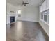 Spacious and bright living room with hardwood floors and a fireplace, perfect for entertaining at 253 Palmetto Walk Dr, Summerville, SC 29486