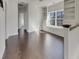 Spacious loft area with hardwood floors, a window seat, and built-in bookshelves at 253 Palmetto Walk Dr, Summerville, SC 29486