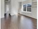 Loft featuring hardwood floors, a window seat, and built-in bookshelves at 253 Palmetto Walk Dr, Summerville, SC 29486