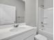 Clean bathroom featuring a shower-tub combo and a vanity sink at 259 N Light Way, Summerville, SC 29486