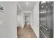 Bright hallway with wood flooring that welcomes you into the home at 259 N Light Way, Summerville, SC 29486