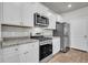 Close up view of a modern kitchen with stainless steel appliances and granite countertops at 259 N Light Way, Summerville, SC 29486