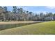 The home is backed up to a serene pond at 259 N Light Way, Summerville, SC 29486