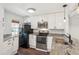 Contemporary kitchen equipped with granite countertops, stainless steel appliances, and white cabinets at 270 Stefan Dr # 11-C, Charleston, SC 29412