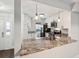 Open-concept kitchen with stainless steel appliances, granite counters, and an adjacent dining area at 270 Stefan Dr # 11-C, Charleston, SC 29412