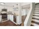 Modern kitchen with stainless steel appliances, granite countertops, and dark wood floors at 270 Stefan Dr # 11-C, Charleston, SC 29412