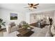 Well-lit living room featuring hardwood floors, stylish seating, and an open layout with the kitchen at 270 Stefan Dr # 11-C, Charleston, SC 29412