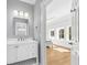 Bathroom featuring a white vanity with countertop space, and an open doorway that leads to a bright bedroom at 2912 Yachtsman Dr, Mount Pleasant, SC 29466