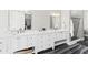Elegant bathroom with double vanity, marble countertop, large mirror, tile floor, and walk-in shower at 2912 Yachtsman Dr, Mount Pleasant, SC 29466