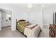 Relaxing bedroom showcasing a comfortable bed, ceiling fan, and easy access to an attached bathroom at 2912 Yachtsman Dr, Mount Pleasant, SC 29466