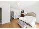 Bright bedroom with white walls, hardwood floors, and large windows, offering a serene and inviting atmosphere at 2912 Yachtsman Dr, Mount Pleasant, SC 29466