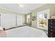 Inviting bedroom featuring hardwood floors, a ceiling fan, and ample closet space at 2912 Yachtsman Dr, Mount Pleasant, SC 29466
