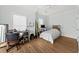 Bright bedroom with white walls, hardwood floors, and large windows, perfect for work and relaxation at 2912 Yachtsman Dr, Mount Pleasant, SC 29466