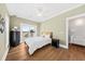 Stylish bedroom with hardwood floors, a ceiling fan, and access to a private balcony at 2912 Yachtsman Dr, Mount Pleasant, SC 29466
