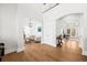 Bright entryway showcasing hardwood floors, modern lighting, and seamless access to multiple living areas at 2912 Yachtsman Dr, Mount Pleasant, SC 29466