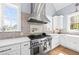 Gourmet kitchen featuring stainless steel appliances, granite countertops, and custom cabinetry at 2912 Yachtsman Dr, Mount Pleasant, SC 29466