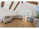 Spacious living room featuring hardwood floors, a vaulted ceiling, and ample seating at 2912 Yachtsman Dr, Mount Pleasant, SC 29466