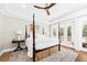 Large main bedroom with a four-poster bed, decorative ceiling and hardwood floors at 2912 Yachtsman Dr, Mount Pleasant, SC 29466