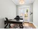Bright office with hardwood floors, French doors to patio and decorative ceiling light at 2912 Yachtsman Dr, Mount Pleasant, SC 29466