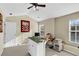 Bright bedroom with ample natural light, a ceiling fan, and dedicated crafting area with island and counter space at 303 Pine Bluff Dr, Summerville, SC 29483