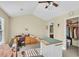 Bright bedroom with ample natural light, a ceiling fan, and dedicated crafting area with island and counter space at 303 Pine Bluff Dr, Summerville, SC 29483