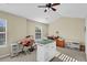Bright bedroom with ample natural light, a ceiling fan, and dedicated crafting area with island and counter space at 303 Pine Bluff Dr, Summerville, SC 29483