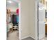 View into walk-in closet with clothing racks and shelving with an adjacent bathroom at 303 Pine Bluff Dr, Summerville, SC 29483