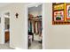 Bedroom walk in closet featuring plenty of storage space, with closet organizers, plus an adjacent bathroom at 303 Pine Bluff Dr, Summerville, SC 29483
