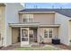 Back exterior of house featuring a screened in patio, multiple windows, and an air conditioning unit at 303 Pine Bluff Dr, Summerville, SC 29483