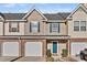 Charming townhome featuring a brick foundation, siding and attached one car garage at 303 Pine Bluff Dr, Summerville, SC 29483