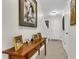 Home foyer showcasing a console table, artwork, and tile flooring at 303 Pine Bluff Dr, Summerville, SC 29483