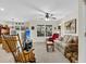 Inviting living room with carpet, ceiling fan and plenty of natural light at 303 Pine Bluff Dr, Summerville, SC 29483
