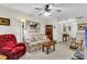 Relaxing living room featuring a ceiling fan, and comfortable furnishings at 303 Pine Bluff Dr, Summerville, SC 29483