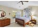 Well-lit bedroom with a comfortable bed, dresser, and bright window at 303 Pine Bluff Dr, Summerville, SC 29483
