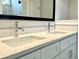 Bathroom vanity featuring dual undermount sinks, chrome faucets, and quartz countertops at 310 Woodland Shores Rd, Charleston, SC 29412